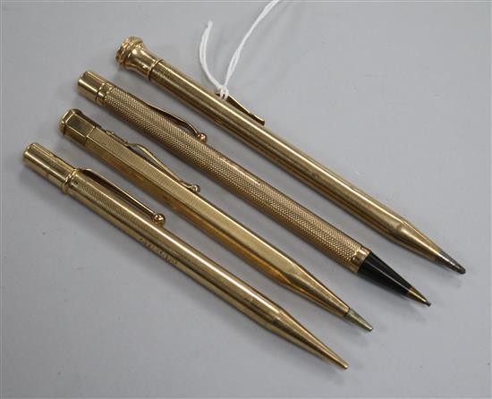 Four assorted 1930s/1940s 9ct gold overlaid pencils.